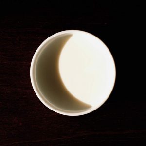 Shadow in a cup of milk