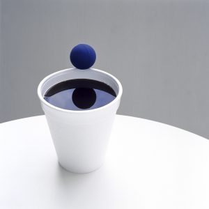 Bouncing ball on the edge of a styrofoam cup